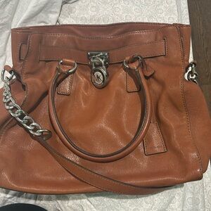 Brown leather Michael Kors hand bag with chain link shoulder strap